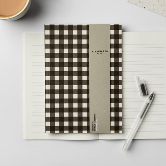 Notebook with black and white gingham checked design