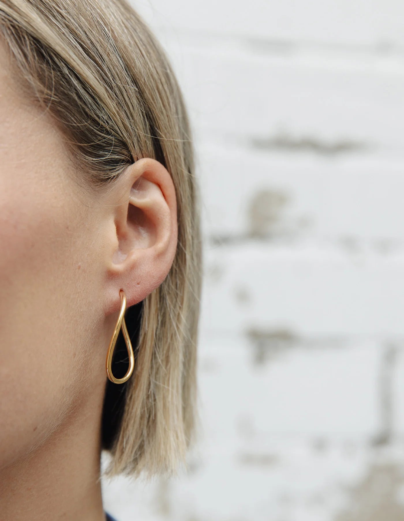 Gold Oval Fluid Hoop Earrings