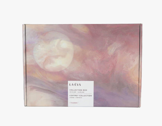 Pink rectangular box with LA EVA COLLECTION SKINCARE HAIRCARE COFFRET COLLECTION VISAGE CHEVEUX /roseum/ printed in brown on a cream sticker on the centre of the box