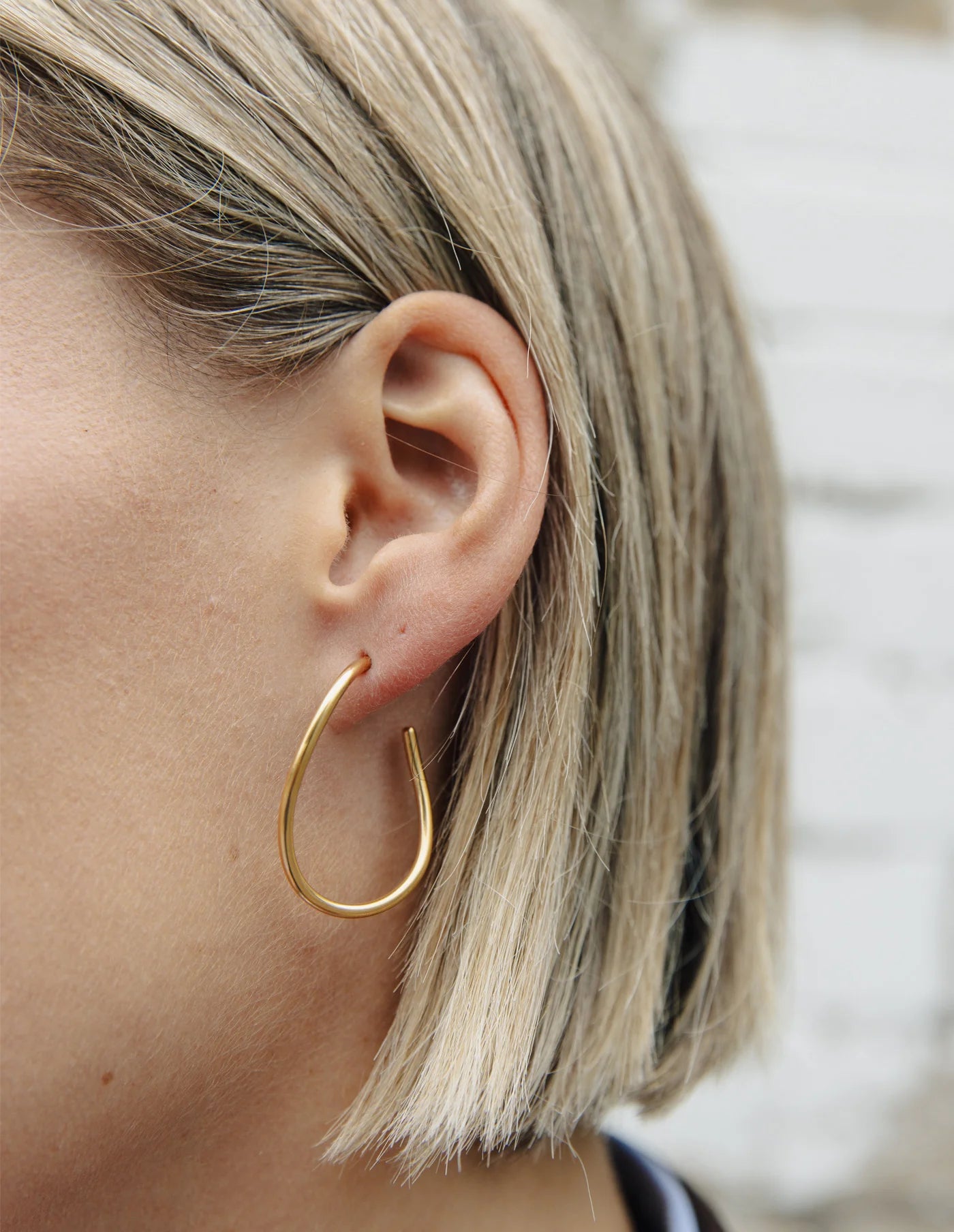 Gold Oval Fluid Hoop Earrings