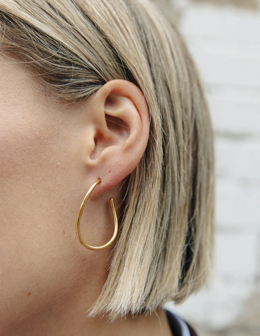 Gold Oval Fluid Hoop Earrings