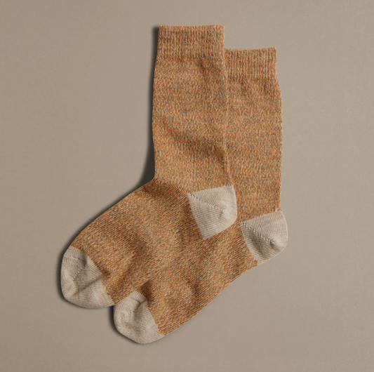 Soft merino socks apricot orange marl speckled with grey and beige with beige heel size 37-41 4-7 made in Britain’s 83% merino wool17% nylon white card with ROVE printed in uppercase letters
