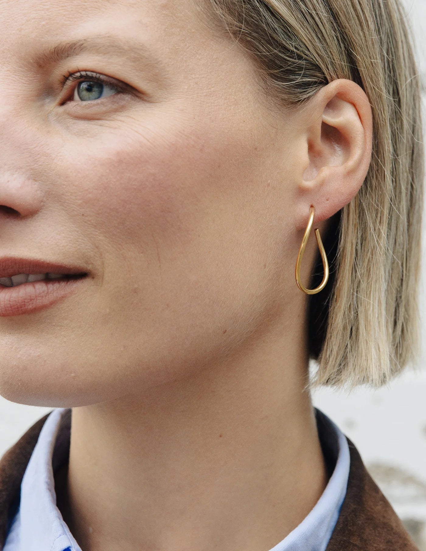 Gold Oval Fluid Hoop Earrings