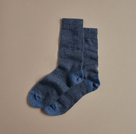 Merino sock dark navy blue and blue marled speckled with blue heel size 37-41 uk 4-7 83% merino wool 17% nylon made in Britain with white card with Rove printed in black uppercase letters