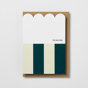 White greetings card with a scalloped top edge the bottom half wide striped in dark green and cream with the best dad printed in lowercase dark grey lettering with a craft coloured brown envelope 